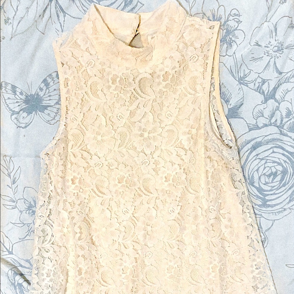 Women cream color laced blouse